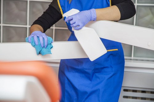 Trained carpet cleaner preparing equipment with care and attention